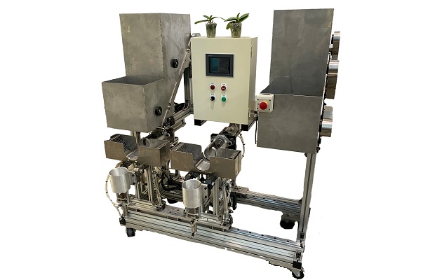 圖五、水苔介質進料裝置與往復式裝盆機